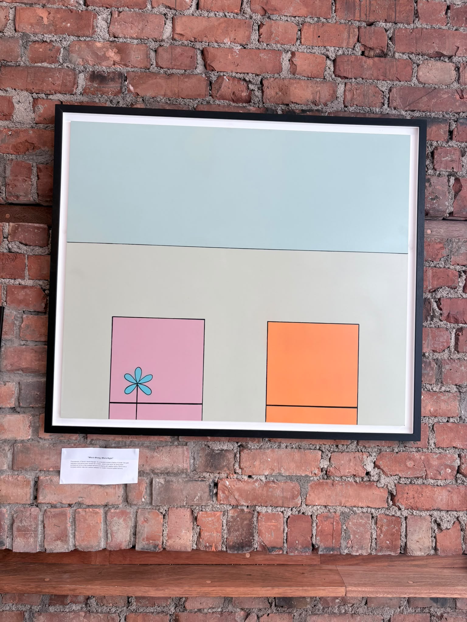 "Who's Wrong, Who's Right" by Dominic Denis - framed painting: a pale house front with a pink window holding a blue flower and an orange window beside it