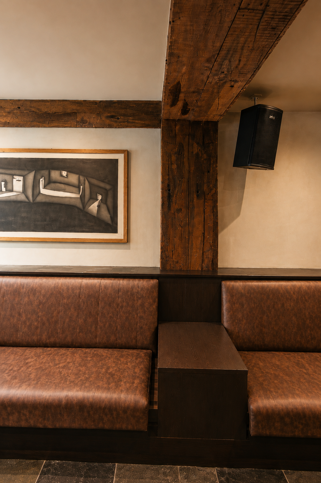 Leather booth seating under the original beams